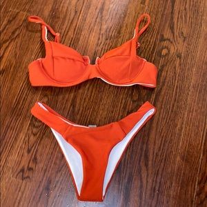 NWT rust colored bikini. Adjustable size M